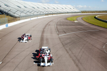 Formula one team on track preparing the car for the race 
