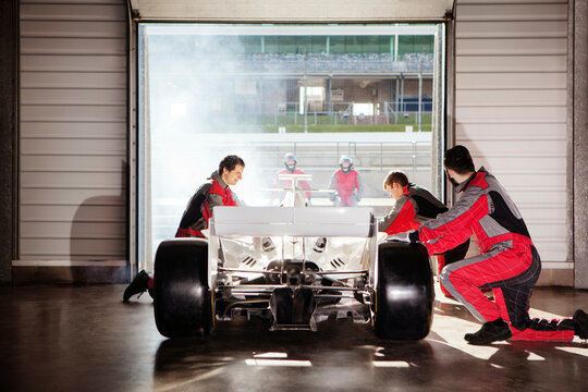 Pit crew in action during a highoctane race day. 