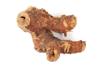 A pile of Dry Organic Kulanjan (Alpinia galanga) roots, isolated on a white background. Top view