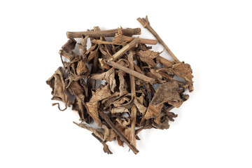 A pile of Dry Organic Punarnava (Boerhaavia diffusa) roots and leaves, isolated on a white...