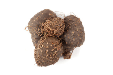 A pile of Dry Organic Varahikanda (Dioscorea bulbifera) fruit, isolated on a white background. Top view