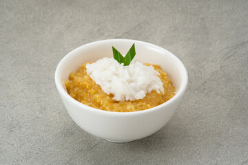 Bubur Merah Putih. Made from rice, brown sugar, coconut milk, pandan leaves. Indonesian food.
