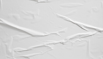 Blank white crumpled and creased paper poster texture background with free copyspace for text