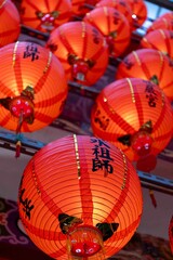 Riufang, Taiwan, 13 february 2024. Rows of chinese red lanterns inside the city temple. Religion symbol.