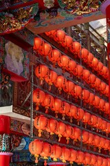 Riufang, Taiwan, 13 february 2024. Rows of chinese red lanterns inside the city temple. Religion symbol.