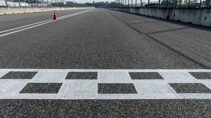 Foto op Plexiglas Aerial view abstract asphalt black Start and Finish grid line for race car in circuit texture background, Automobile and automotive background. © Kalyakan