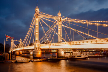 Obraz premium Albert Bridge is a road bridge over the River Thames connecting Chelsea in Central London