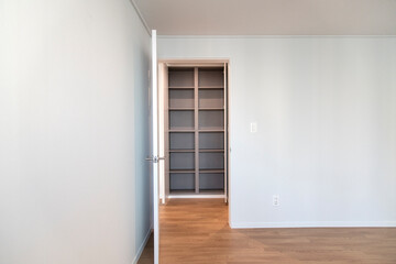 The wooden shelf of the renovated apartment