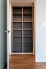 The wooden shelf of the renovated apartment