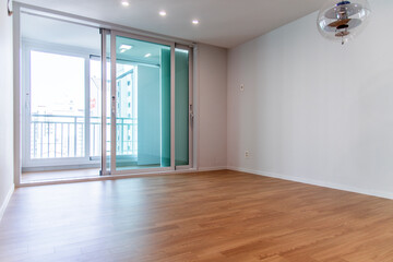 The interior of the renovated living room in the apartment