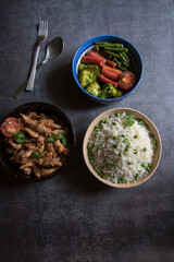 Healthy meal rice, chicken and boiled vegetables. Top view, selective focus.