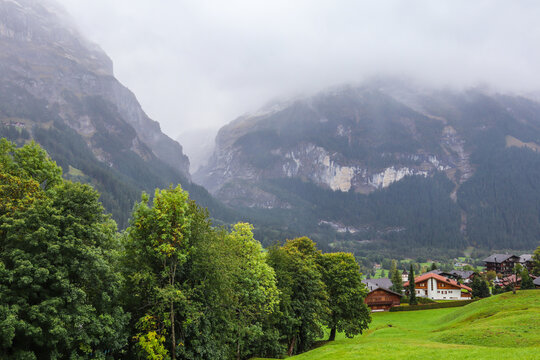 Grindelwald, Switzerland landscape in the morning with fog.