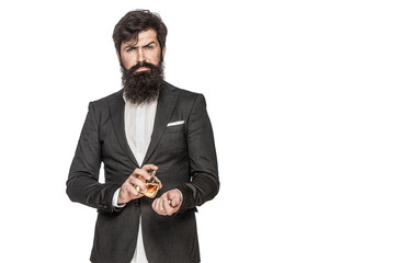 Man holds cosmetics, serum in a vial, applying on the hands. Male fragrance and perfumery,...