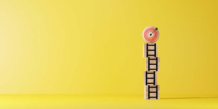 Dartboard with arrow on the top of ladders step for target and goal concept.