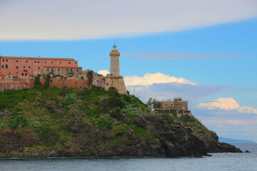 Fototapeta na wymiar Faro di Forte Stella lighthouse Portoferraio on Elba island, Livorno, Italy