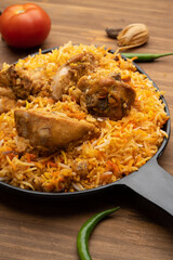 Restaurant style Spicy Chicken Biryani served with Raita and Salan, Popular Indian or Pakistani non vegetarian Food