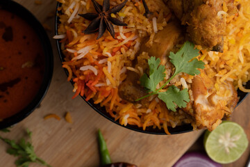 Restaurant style Spicy Chicken Biryani served with Raita and Salan, Popular Indian or Pakistani non vegetarian Food
