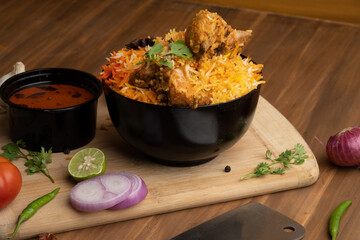 Restaurant style Spicy Chicken Biryani served with Raita and Salan, Popular Indian or Pakistani non vegetarian Food