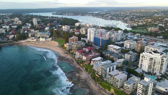 Aerial drone view of Cronulla in the Sutherland Shire, South Sydney, NSW Australia looking toward Gunnamatta Bay on the Port Hacking during the early morning in February 2024 