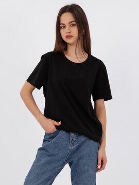 mockup of a black loose-fitting t-shirt on a young beautiful girl