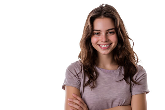woman with folded arms and a warm smile, conveying authority with approachability.