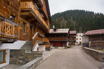 Traditional wooden houses in the historic mountain village of Cima Sappada in Carnia in Udine Province, Friuli-Venezia Giulia, north east Italy