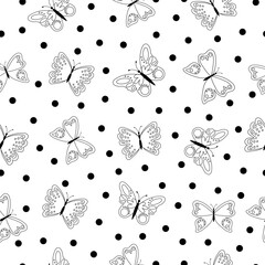 Seamless polka dot pattern with butterflies in black and white colors.