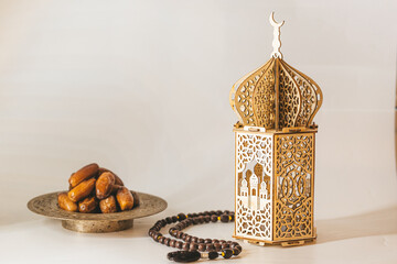Arabian lantern, dates and rosary. Islamic holidays concept. Ramadan decoration. Ramadan kareem.