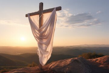 Wooden cross with white scarf at sunrise on rocks. Easter and crucifixion theme - 747074859