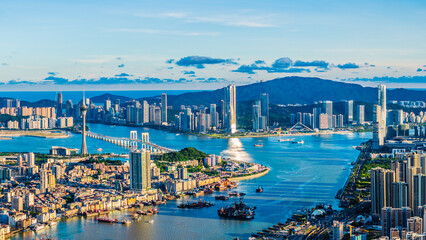 Aerial view of Zhuhai and Macau city skyline with modern buildings scenery at sunset, China. High...