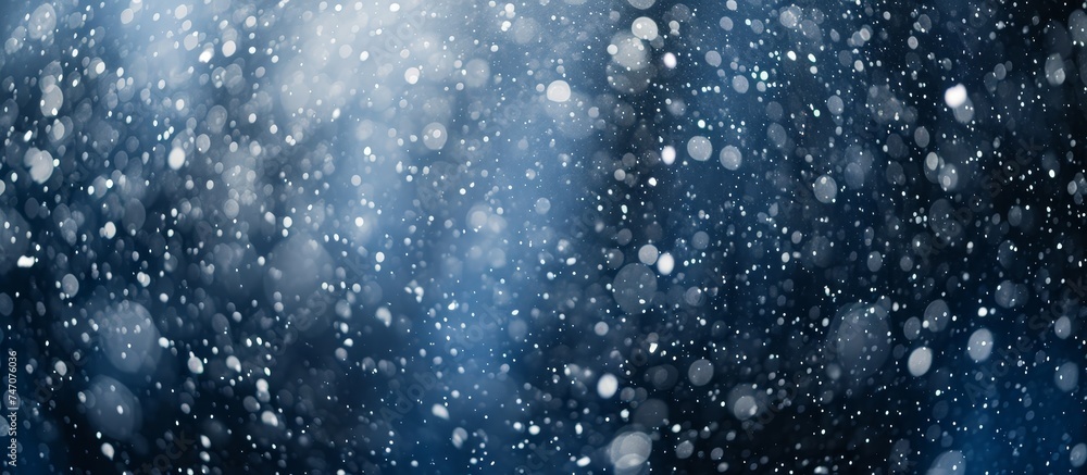 Poster liquid precipitation in the form of snow is falling on an electric blue background, creating a beaut