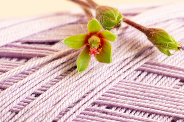Stretched threads, publication background, green flower