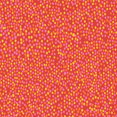 A pattern of pink, red and yellow oval dots on a white background.