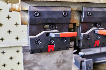 clamp for the upper segments of the hydraulic bending machine. selective focus