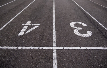 Numbers on an athletics track - 747087482