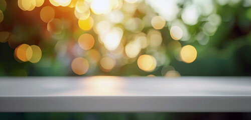 Side view of an empty white wooden table top in a garden. Image with a gentle blurred soft light background of garden foilage. Bokeh effect. Easter, spring holiday concept with copy space. - 747090436