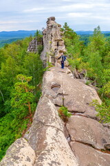 Magnificent rocks of the Arakul shikhan of the granite rock massif of the Middle Urals on a summer...
