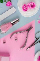 Manicure and pedicure toots on pink background for banner. spa salon for your nail. Beautu concept. flat lay