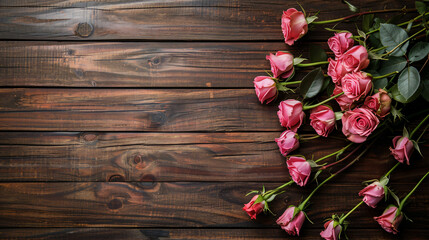 Fototapeta na wymiar A Bouquet of Pink Roses on Wooden Background