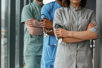 With stethoscope. Group of doctors are together indoors