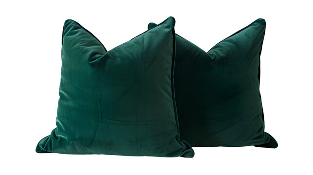  A duo of lavish emerald green velvet cushions arranged neatly on a modern, Transparent background