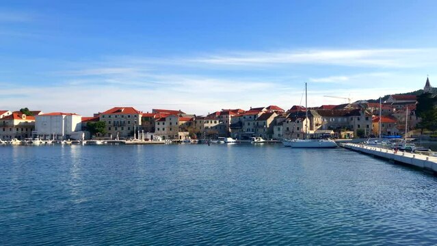View of beautiful seaside town. Postira harbour. Coastal town of Postira. Brac Island, Croatia. Europe.