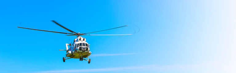 Helicopter in the sky at approach on sunlight © bborriss
