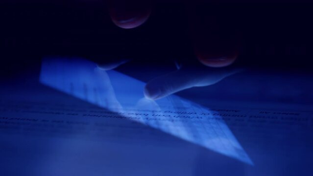Background of extremely close-up  human fingers scrolling touching the tablet screen. Social media communication.