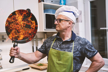 Man chef with f fiery pan saying GET COOKING