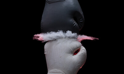 Two Boxing Glove in silver and gold punch hit together. Business challenge fighting concept. Smoke...