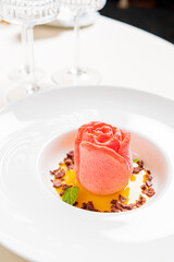  tartlet rose  with sauce on plate