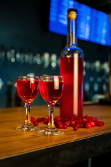 alcohol drink with berres in the bar