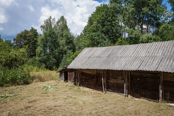 Old wooden barn. Rural courtyard	