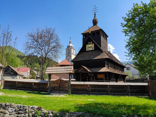 Fototapeta na wymiar Wooden church in a village in western Ukraine